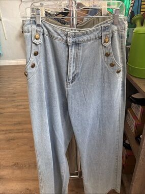 Light Blue Denim Jeans with Button-Accent Pockets